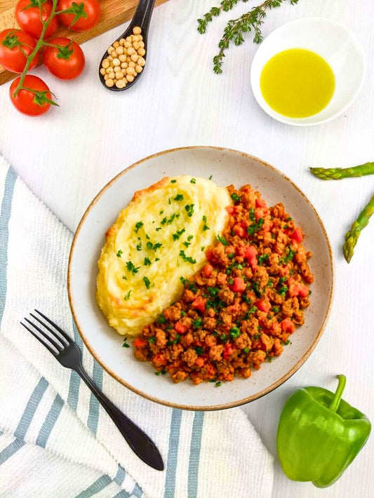Poulet haché aux légumes & purée de pomme de terre aux herbes fines